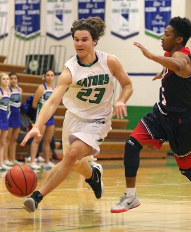 Green ValleyÃ­s Matt Tuttle, left, drives the ball past LibertyÃ­s David Bravo during a ...