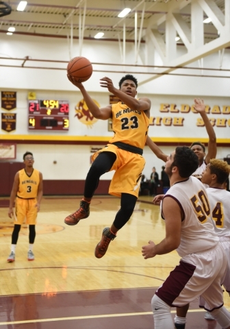 Bonanza‘s Davian Jordan (23) goes up for a layup against Eldorado‘s defense duri ...