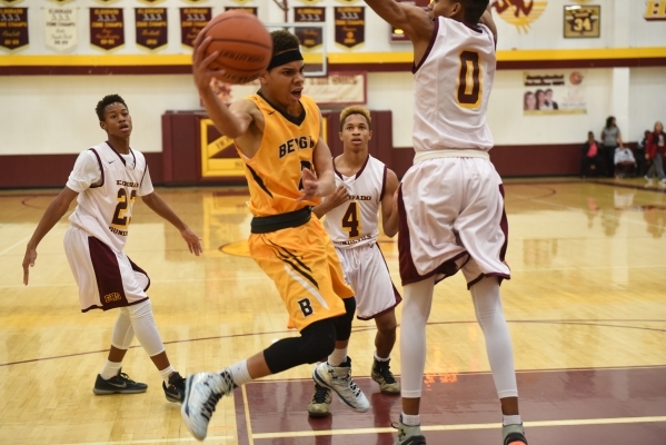 Bonanza‘s Travis Jenkins (2) attempts a pass against Eldorado‘s defense during t ...