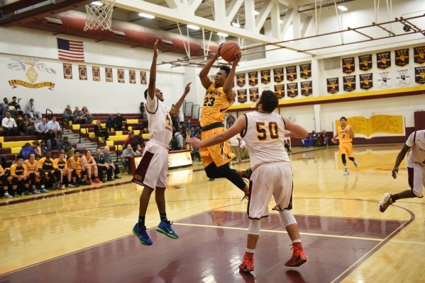 Bonanza‘s Davian Jordan (23) goes up for a layup against Eldorado‘s Carmonte Jon ...