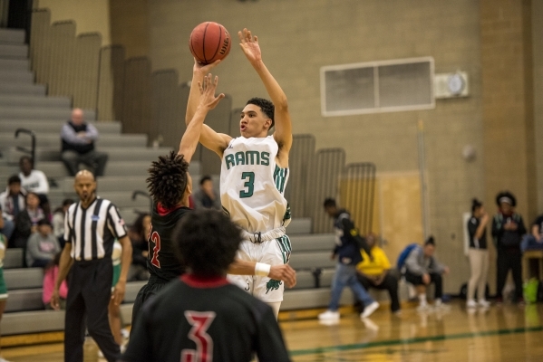 Chris Jackson (3) of the Rancho Rams takes a shot against the Las Vegas Wildcats during a ba ...