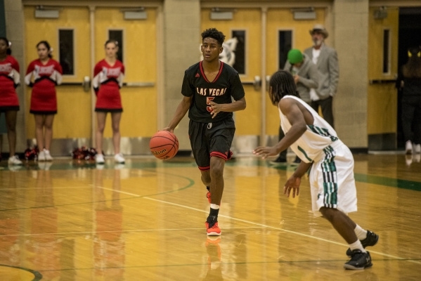 Deondre Northey (5) of the Las Vegas Wildcats moves with the ball against the Rancho Rams du ...