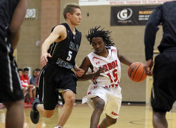 Arbor View‘s Cameron Trailer, right, drives the ball against Palo Verde‘s James ...