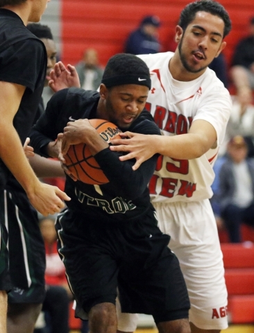 Palo Verde‘s Christian Bryant, left, struggles to keep possession of the ball against ...