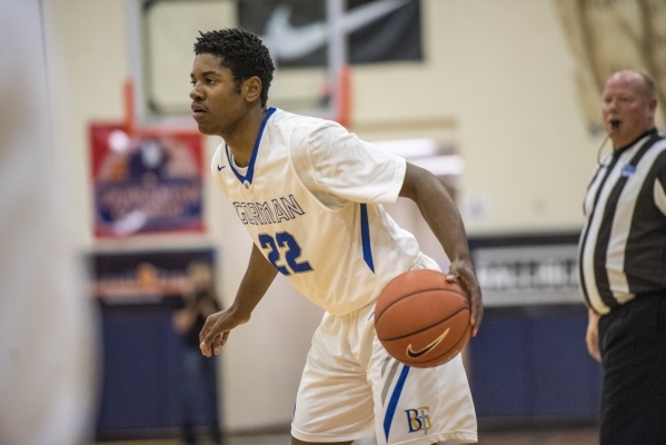 Bishop Gorman guard Christian Popoola Jr. (22) looks to make a play against Timpview (Utah) ...