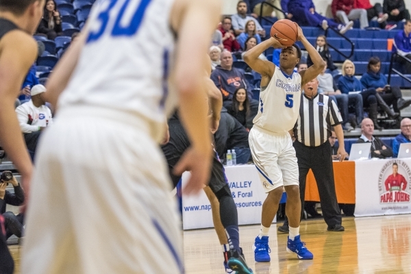 Bishop Gorman guard Chuck O‘Bannon (5) takes a shot against Timpview (Utah) during the ...