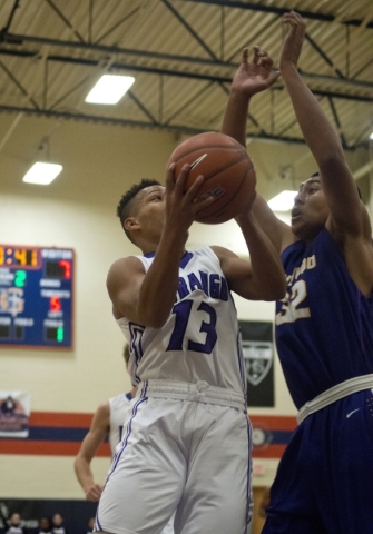 Durango High School‘s Demetrius Valdez (13) works the ball toward the net as Lynwood H ...