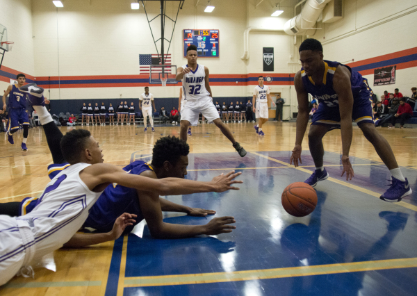 Durango High School‘s Michael Diggins (2) and Lynwood High School‘s Joe Tate (1) ...