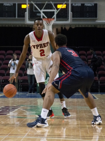 Victory Prep‘s Jarred Vanderbilt (2) attempts to move the ball past Findlay Prep&lsquo ...