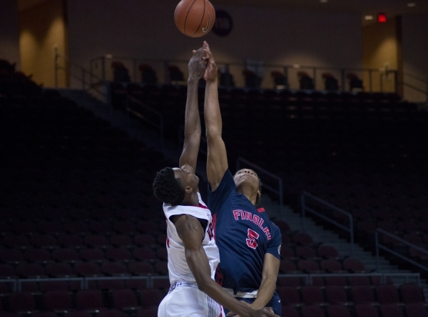 Findlay Prep‘s PJ Washington (5) and Victory Prep‘s Jarred Vanderbilt (2) jump f ...