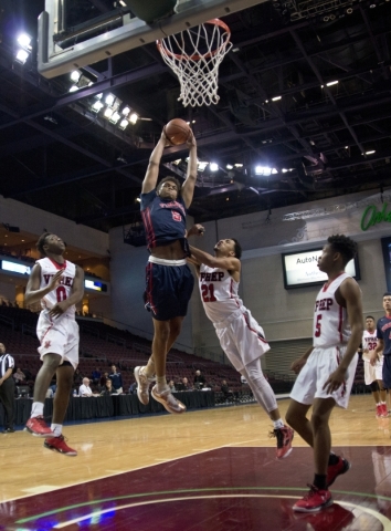 Findlay Prep‘s PJ Washington (5) takes the ball to the net as Victory Prep‘s Mar ...