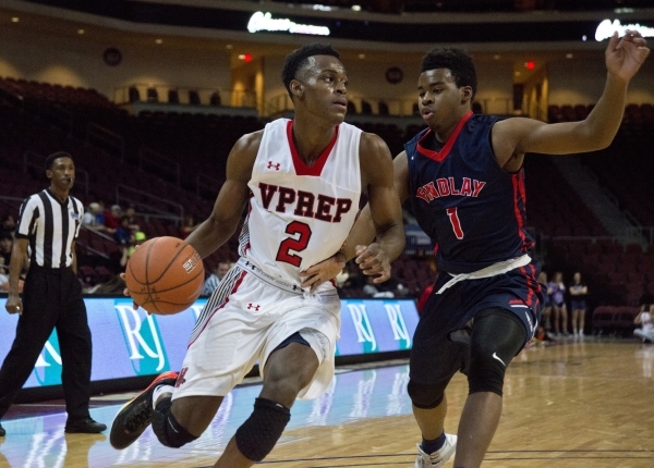 Victory Prep‘s Jarred Vanderbilt (2) attempts to get around Findlay Prep‘s Devon ...