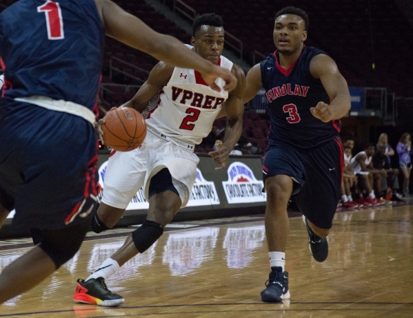 Victory Prep‘s Jarred Vanderbilt (2) attempts to get around Findlay Prep‘s Carlo ...