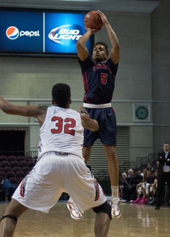 Findlay Prep‘s PJ Washington (5) makes a three point shot during the fourth annual Tar ...