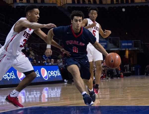 Findlay Prep‘s Markus Howard (0) moves the ball past Victory Prep‘s Emery Vander ...