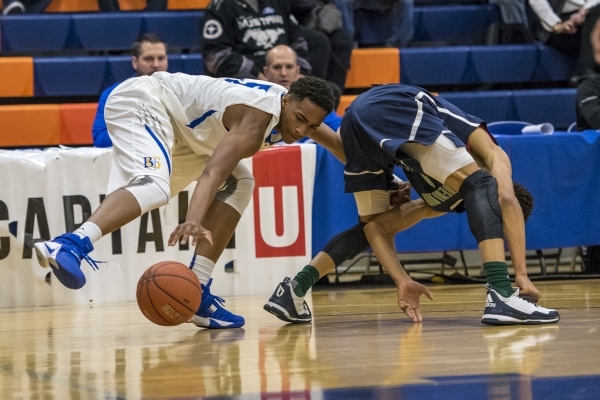 Bishop Gorman guard Chuck O‘Bannon (5) scrambles for the ball against Overland, Colo., ...