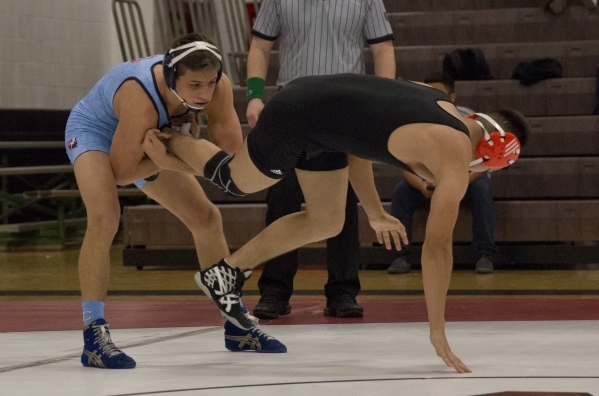 Centennial‘s Nico Antuna, left, wrestles Chaparral‘s Julio Bravo during a quad m ...