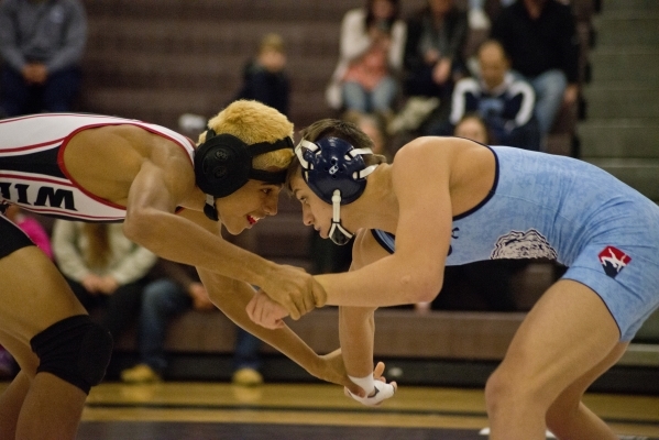 Centennial‘s Nico Antuna, right, wrestles Las Vegas‘ Aaron Najera during a quad ...