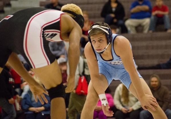 Centennial‘s Nico Antuna, right, wrestles Las Vegas‘ Aaron Najera during a quad ...