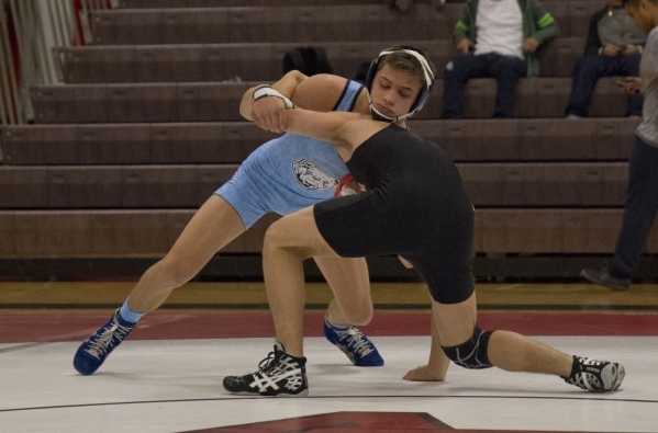 Centennial‘s Nico Antuna, left, wrestles Chaparral‘s Julio Bravo during a quad m ...