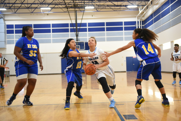 Canyon Springs J‘hane Richardson (40) drives past California‘s Mount Eden defend ...