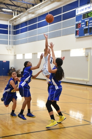 Canyon Springs Aleza Bell (2) shoots the ball against California‘s Mount Eden defense ...