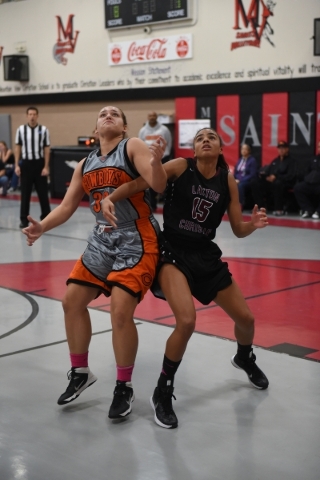 Chaparral‘s Sierra Shaw (32), left, battles Utah‘s Layton Christian Felicia Mars ...