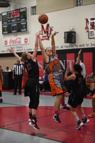 Chaparral‘s Sierra Shaw (32) shoots the ball against Utah‘s Layton Christian def ...