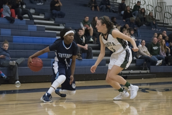 Centennial High School‘s Pam Wilmore (1) drives against Bonita High School‘s Tay ...