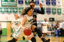 Green Valley‘s Ellee Barton (4) drives against Cheyenne‘s Dominique Hudson (1) d ...