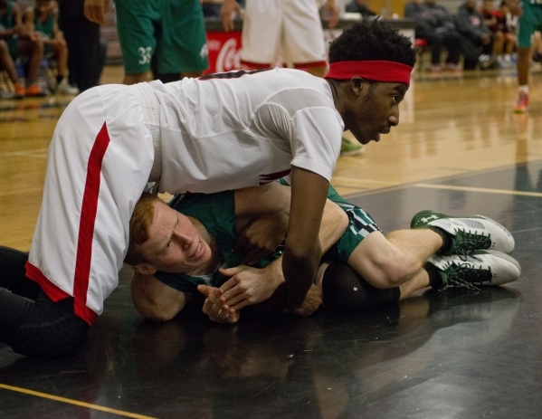 Rancho‘s Tommy Robertson (10) calls a time out while battling for the ball with Las Ve ...