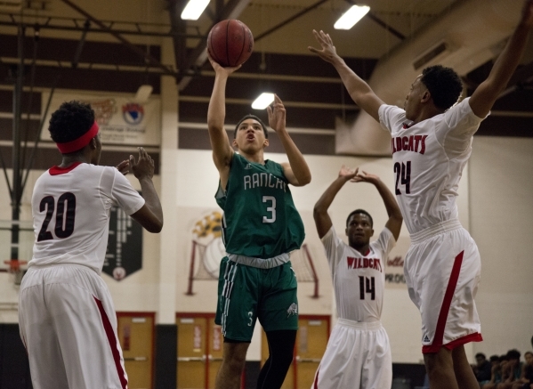 Rancho‘s Chrys Jackson (3) takes a shot at the net during their game against Las Vegas ...