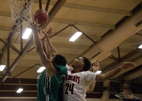 Rancho‘s Lamont Traylor (33) and Las Vegas‘ Zach Matlock (24) go for the ball du ...