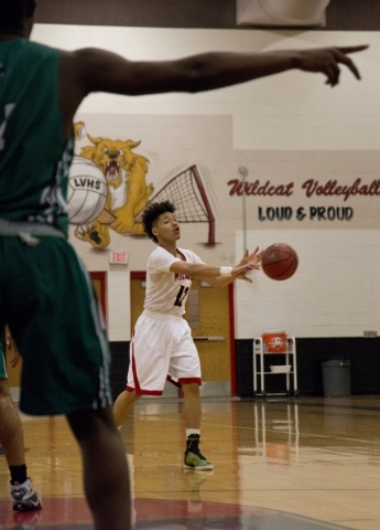 Las Vegas‘ Donovan Joyner (12) passes the ball during their game against Rancho High S ...