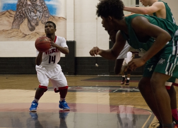 Las Vegas‘ DiQuan Brown (14) attempts a free throw during their game against Rancho Hi ...