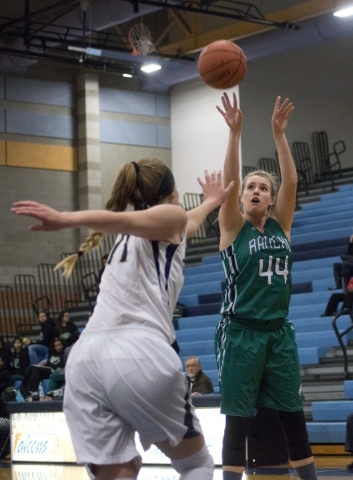 Rancho‘s Samantha Pochop (44) takes a shot over FoothillÃ­s Kylie Vint (11) during ...