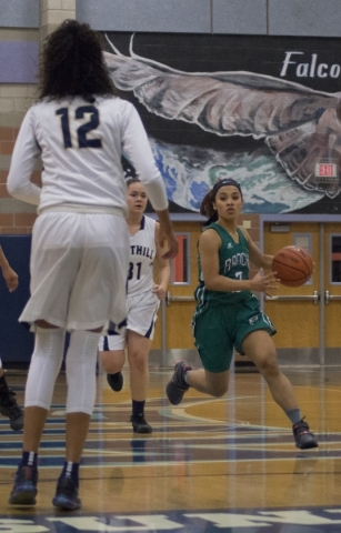 Rancho‘s Maureen Macato (3) works the ball up the court during their game at Foothill ...