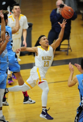 Durango guard Demetrius Valdez (13) goes up for a shot against Centennial in the third quart ...