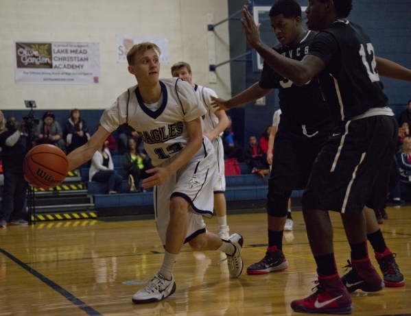 Lake Mead‘s Noah Tassi (13) passes the ball during their home game against Mountain Vi ...