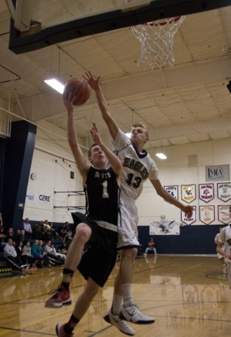 Mountain View‘s Christian Bennett (1) takes a shot at the basket as Lake Mead‘s ...