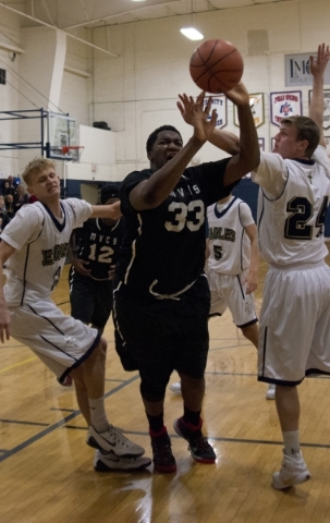 Mountain View‘s Micah Wheeler (33) takes a shot at the basket during their game at Lak ...