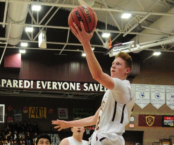 Faith Lutheran forward Elijah Kothe goes up for a shot against Sierra Vista in the first hal ...