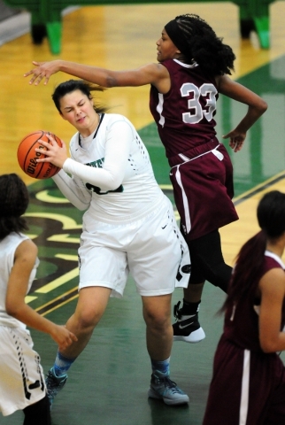 Palo Verde guard Brooklyn Cruz, left, and Palo Verde guard Megan Siqueiros defend Cimarron-M ...