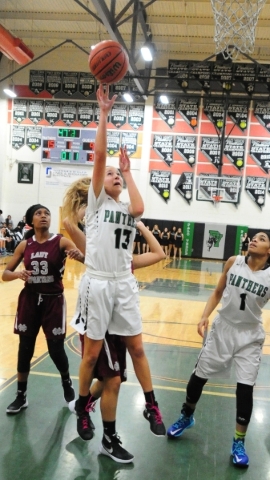 Palo Verde guard Megan Siqueiros (13) goes up for a shot against Cimarron-Memorial in the se ...