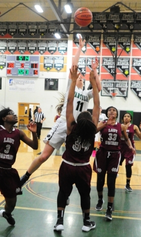 Cimarron-Memorial forward Tasia Moore (34) fouls Palo Verde guard Paulina Silcox in the seco ...