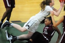 Cimarron-Memorial forward Tasia Moore (34) fouls Palo Verde forward Kaylee Puckett in the th ...