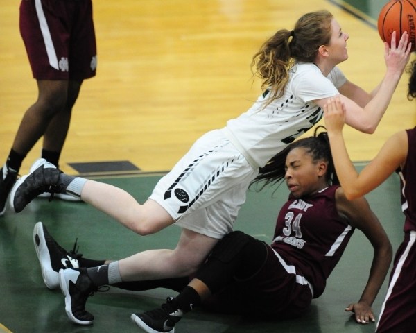 Cimarron-Memorial forward Tasia Moore (34) fouls Palo Verde forward Kaylee Puckett in the th ...