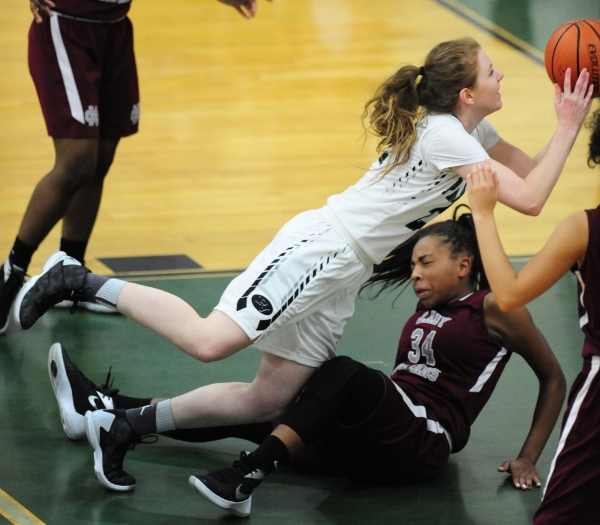 Cimarron-Memorial forward Tasia Moore (34) fouls Palo Verde forward Kaylee Puckett in the th ...