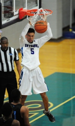 Silverado guard Matthew Arnold dunks against Canyon Springs in the fourth quarter of their p ...