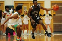 Cheyenne wing Dewayne Alexander (15) intercepts a Mojave pass in front of guard Lamaja Cunni ...